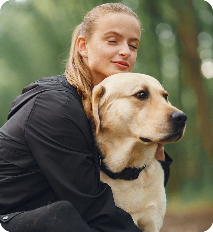 Ever Nuvia — woman hugging her dog