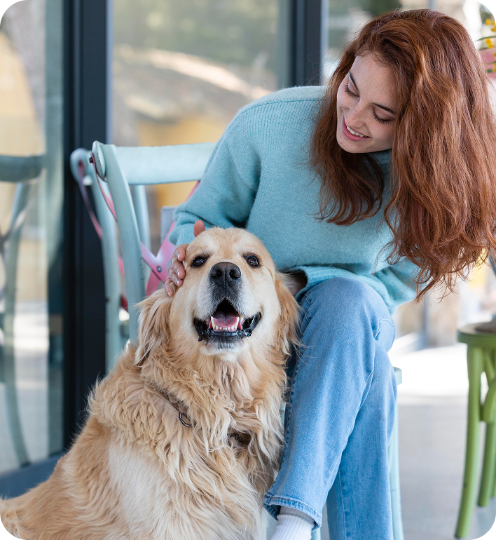 Ever Nuvia — woman hugging her dog